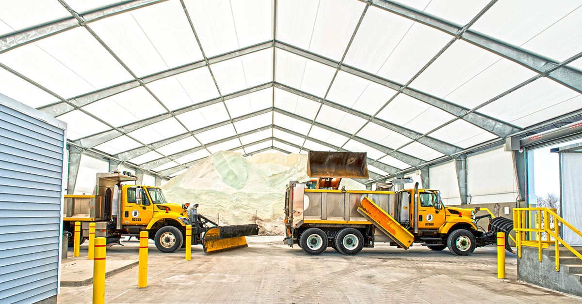 Construction trucks moving materials