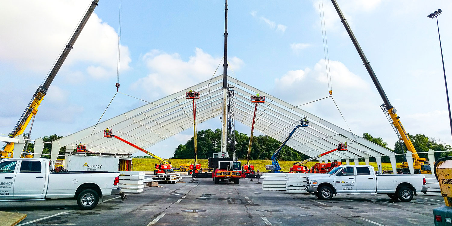 Rigid steel frame for tension fabric structure installation